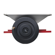 Top view of a large hand-powered grape crusher for wine with a stainless steel hopper and ergonomic wooden handle crank.