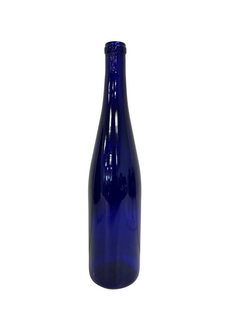 Blue glass bottle on a white background